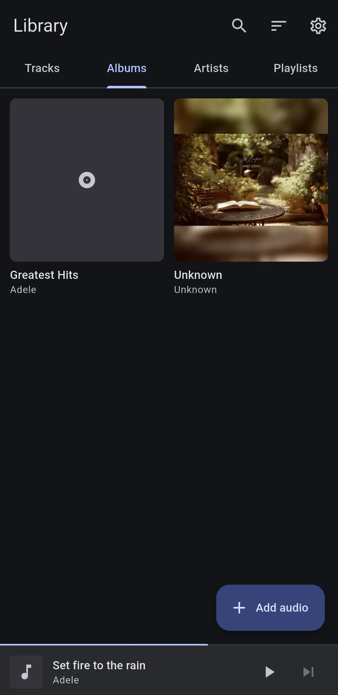 The Opens Audio library, with tabs for tracks, albums, artists and playlists